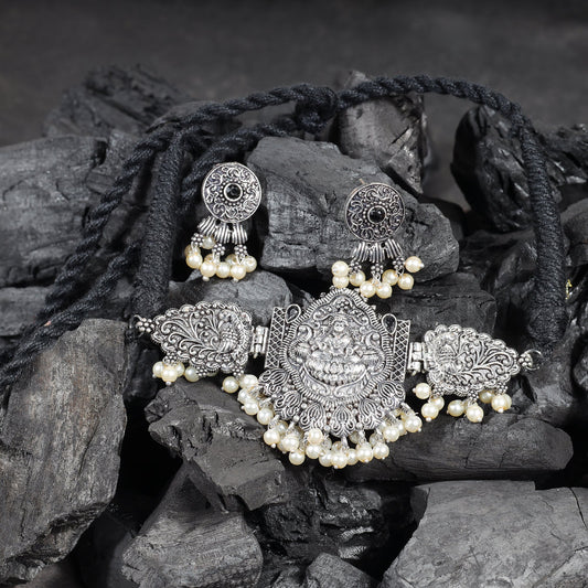 Black Stone studded Laxmi Motif German Silver Neckpiece set