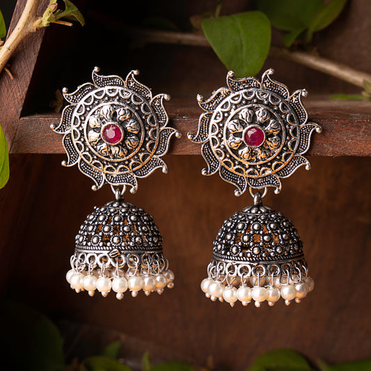 Red Stone Studded German Silver Statement Earrings With Brass Jhumki