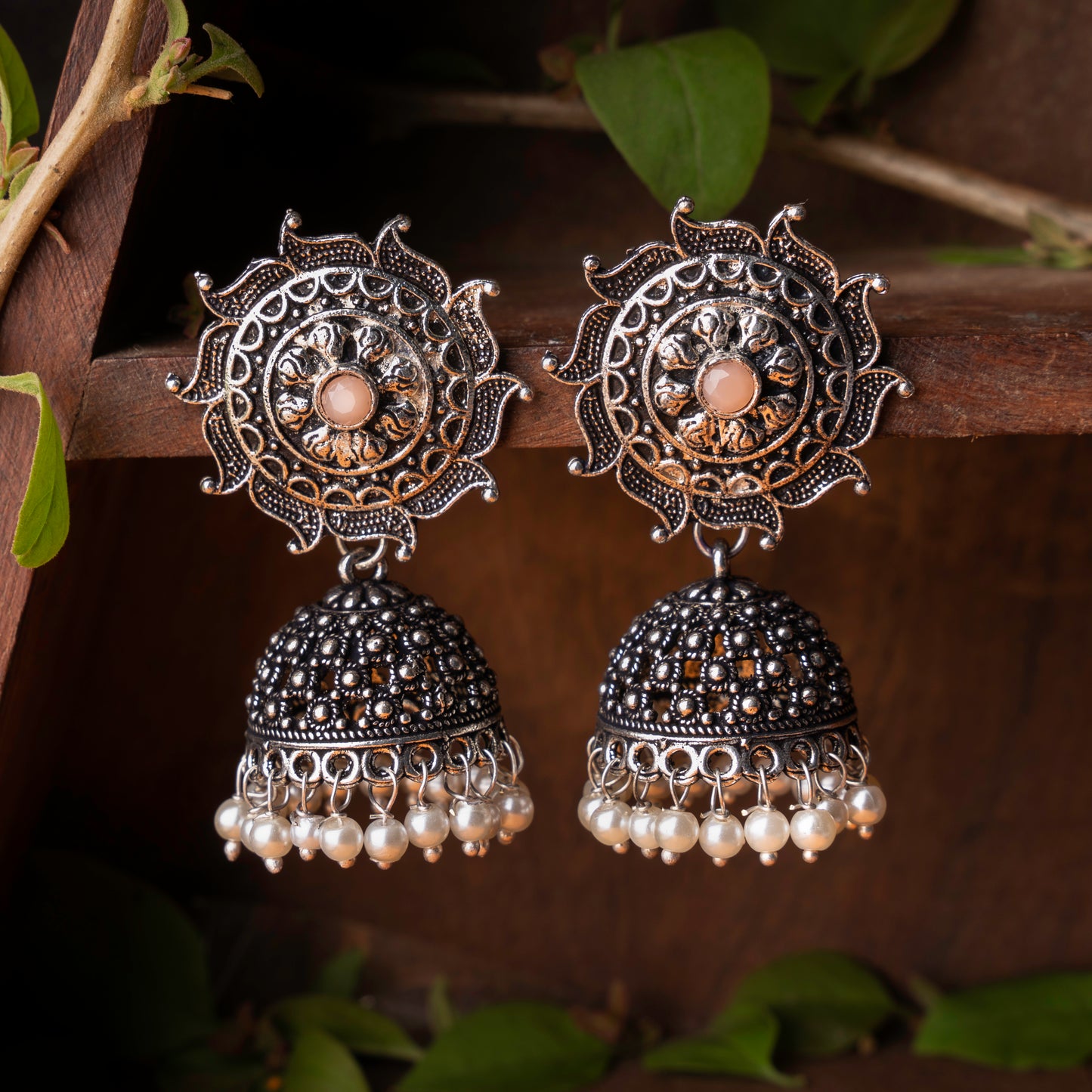 Light Orangish Stone Studded German Silver Statement Earrings With Brass Jhumki