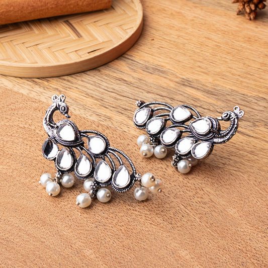 White Stone Studded Peacock Shaped Earrings With Hanging Pearls