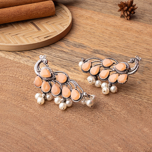 Light Orangish Stone Studded Peacock Shaped Earrings With Hanging Pearls