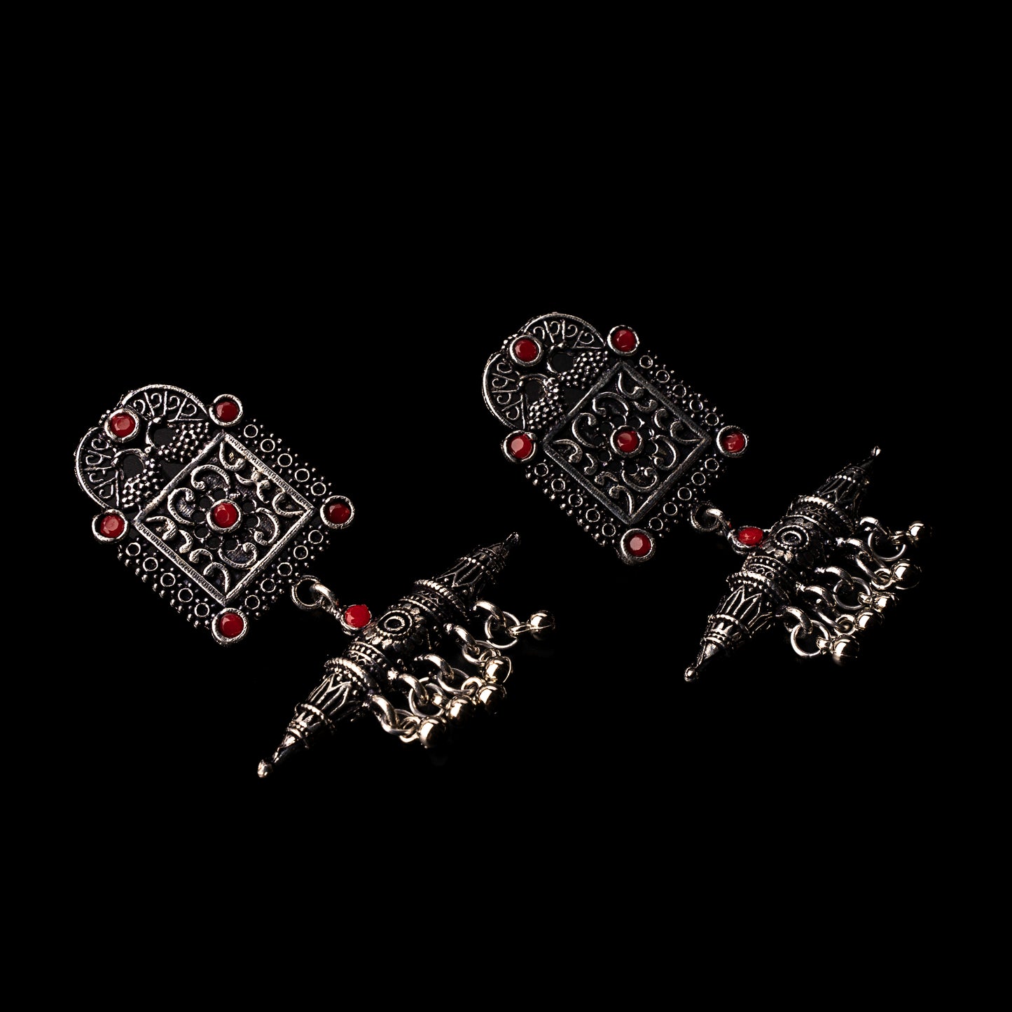 Dark Red Stone Studded Oxidised Statement Earrings With Hanging Ghunghuroo