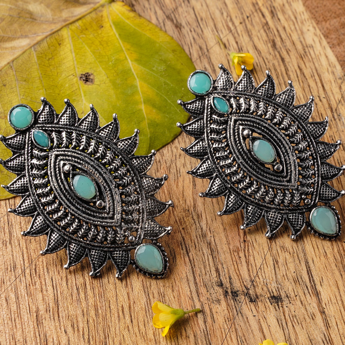 Mint Stone Studded Oval Shaped Oxidised Earrings