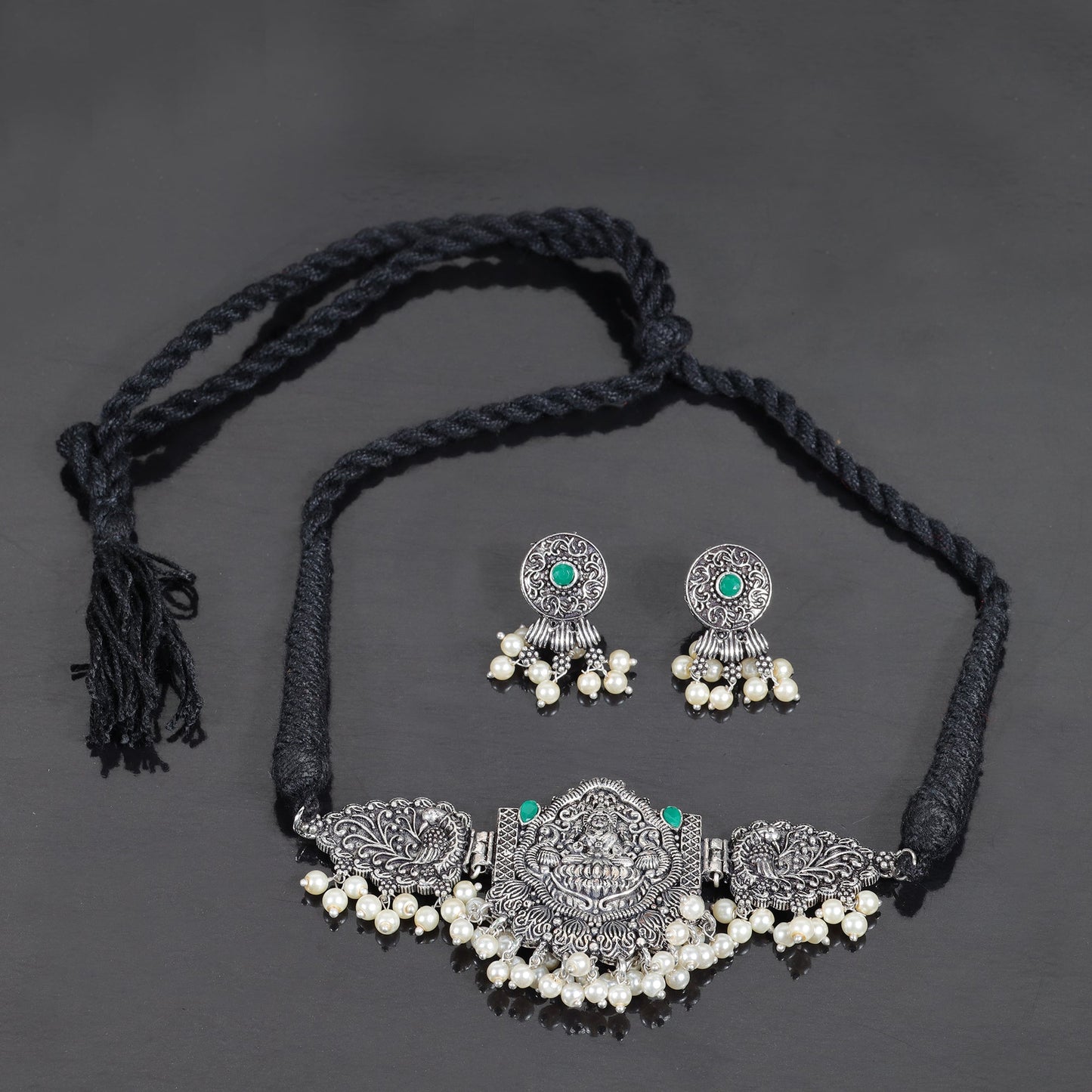 Green Stone studded Laxmi Motif German Silver Neckpiece set