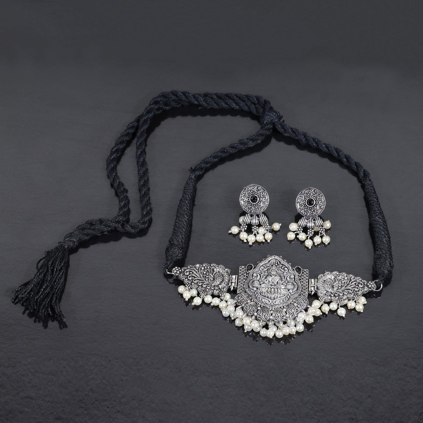 Black Stone studded Laxmi Motif German Silver Neckpiece set