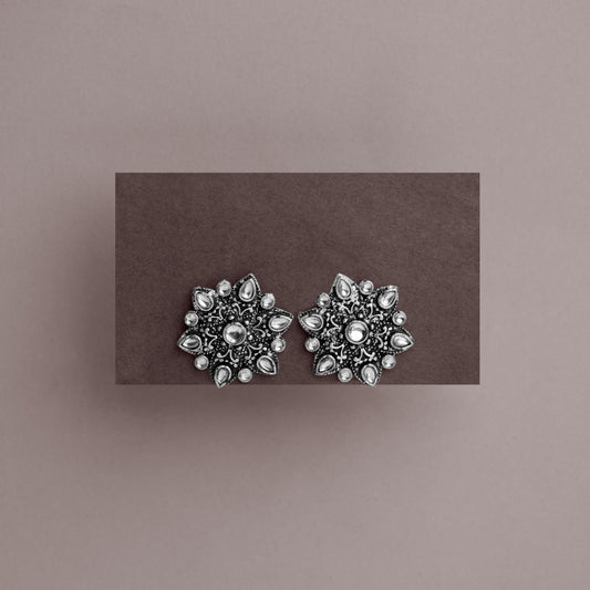 White Stone Studded Star Shaped German Silver Stud Earrings