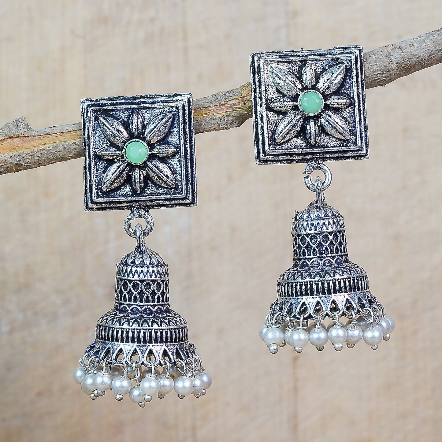 Pista Stone Studded Oxidised Earrings With Hanging Pearls