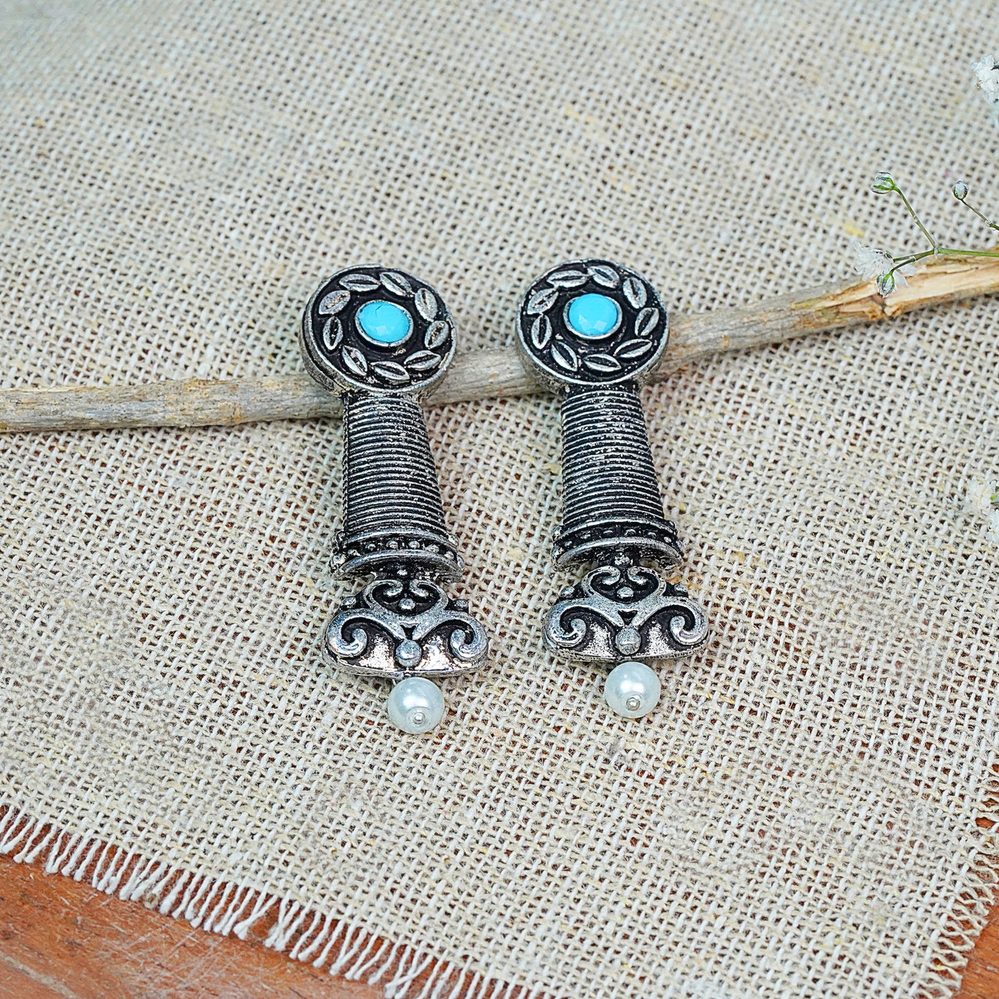 Sky Blue Stone Studded Delicate Oxidised Earrings With Hanging Pearl