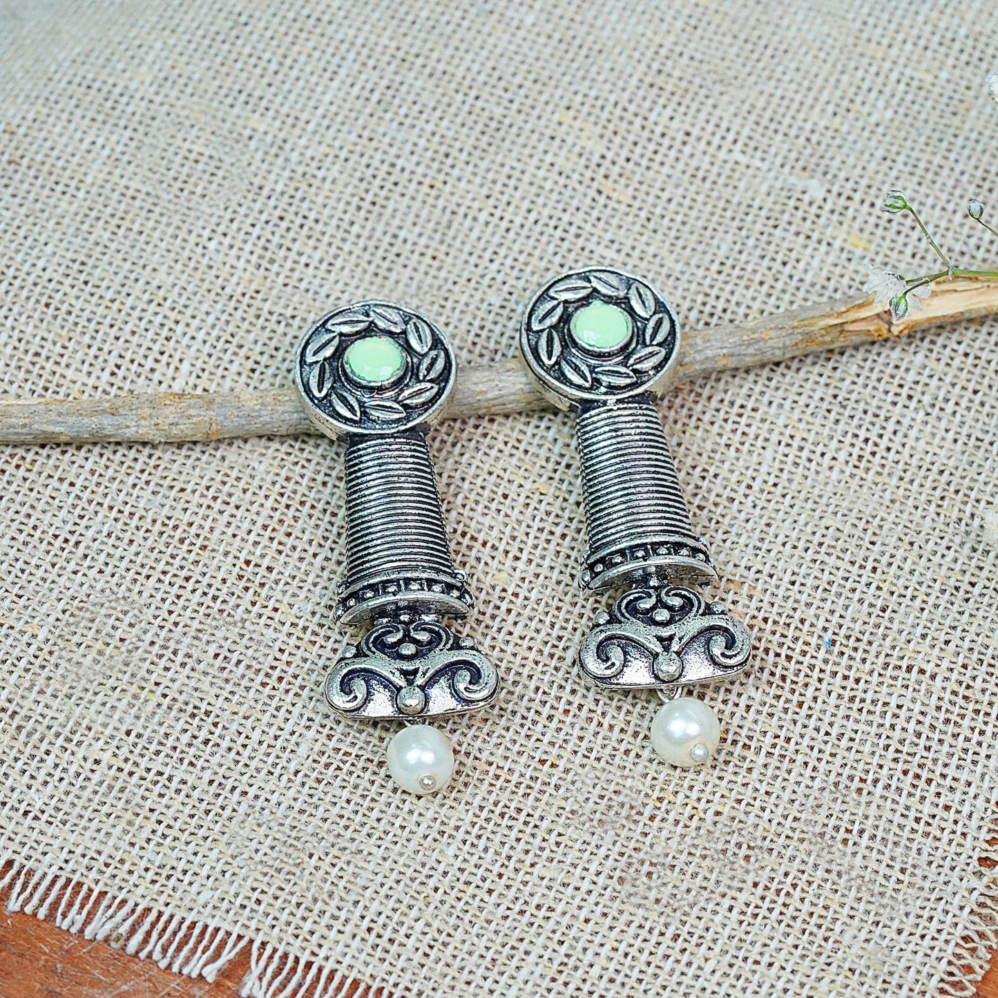 Pista Stone Studded Delicate Oxidised Earrings With Hanging Pearl