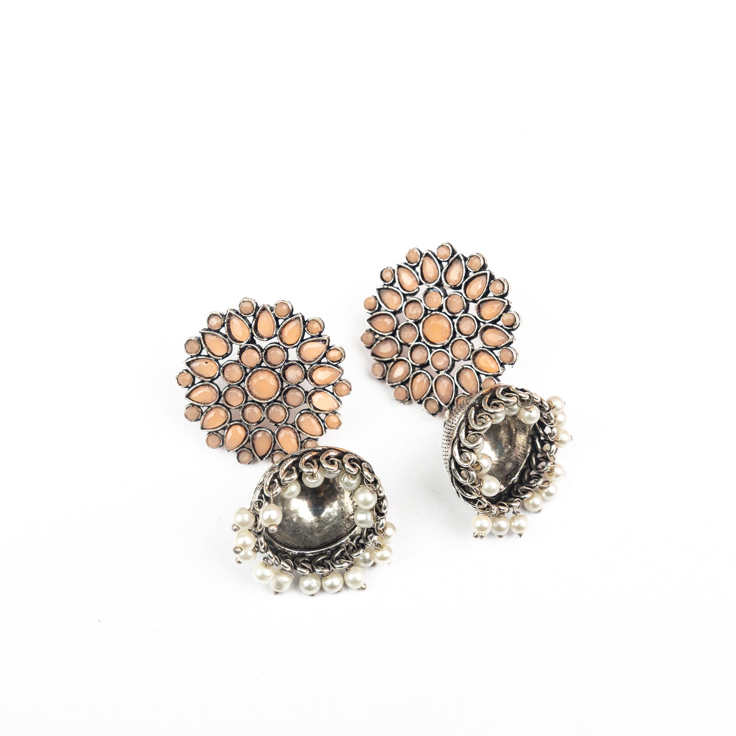 Light Orangish Stone Studded German Silver Statement Earrings With Brass Jhumki