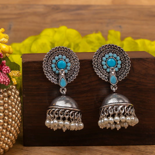 Sky Blue Stone Embellished German Silver Earrings With Hanging Pearls