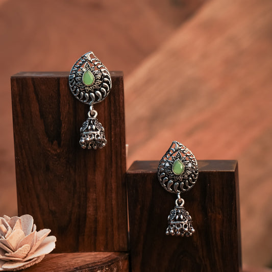 Pista Stone Studded Oxidized Earrings With Hanging Jhumki