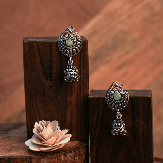 Mint Stone Studded Oxidized Earrings With Hanging Jhumki