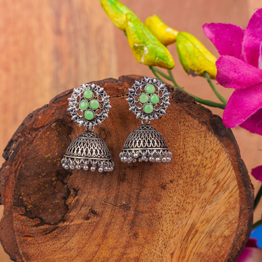 Pista Stone Studded Oxidised Earrings With Hanging Jhumki