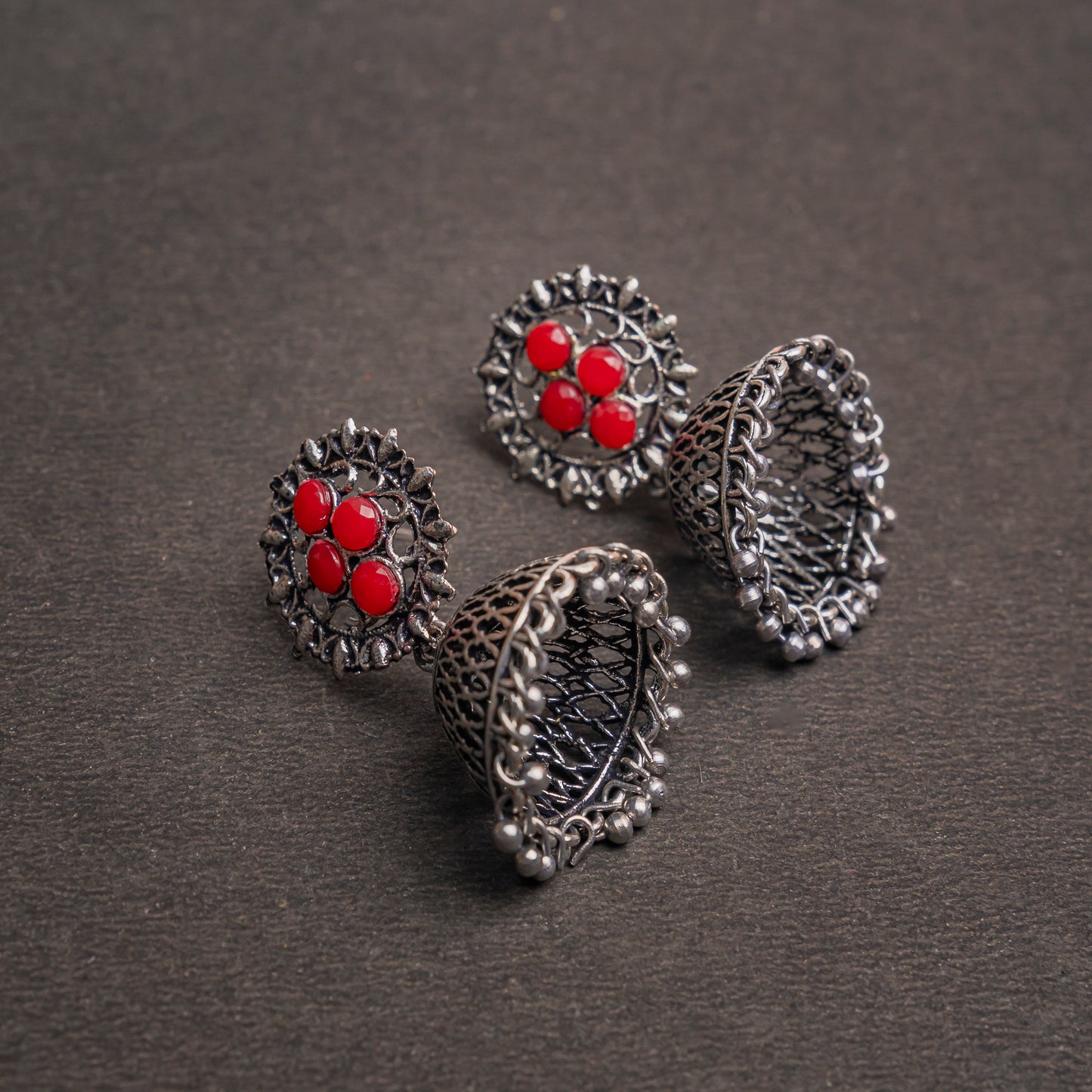 Dark Red Stone Studded Oxidised Earrings With Hanging Jhumki