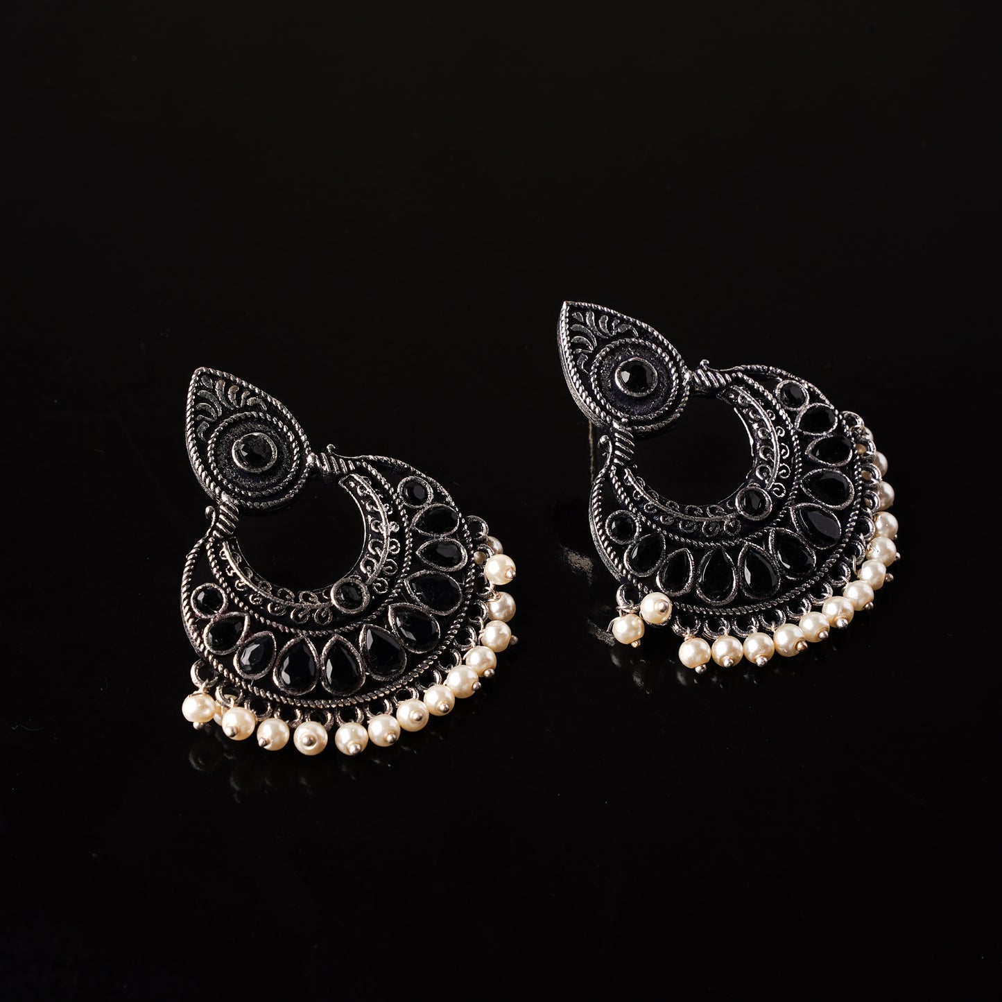 Black Stone Studded Oxidised Earrings With Hanging Pearls