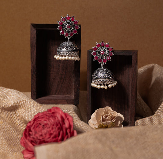 Red Stone Studded German Silver Jhumki Earrings With Hanging Pearls