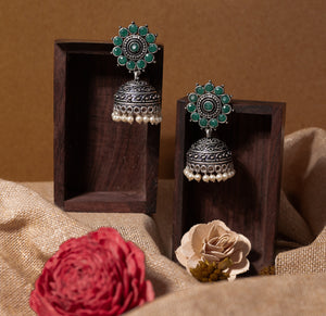 Green Stone Studded German Silver Jhumki Earrings With Hanging Pearls