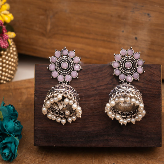 Baby Pink Stone Studded German Silver Jhumki Earrings With Hanging Pearls