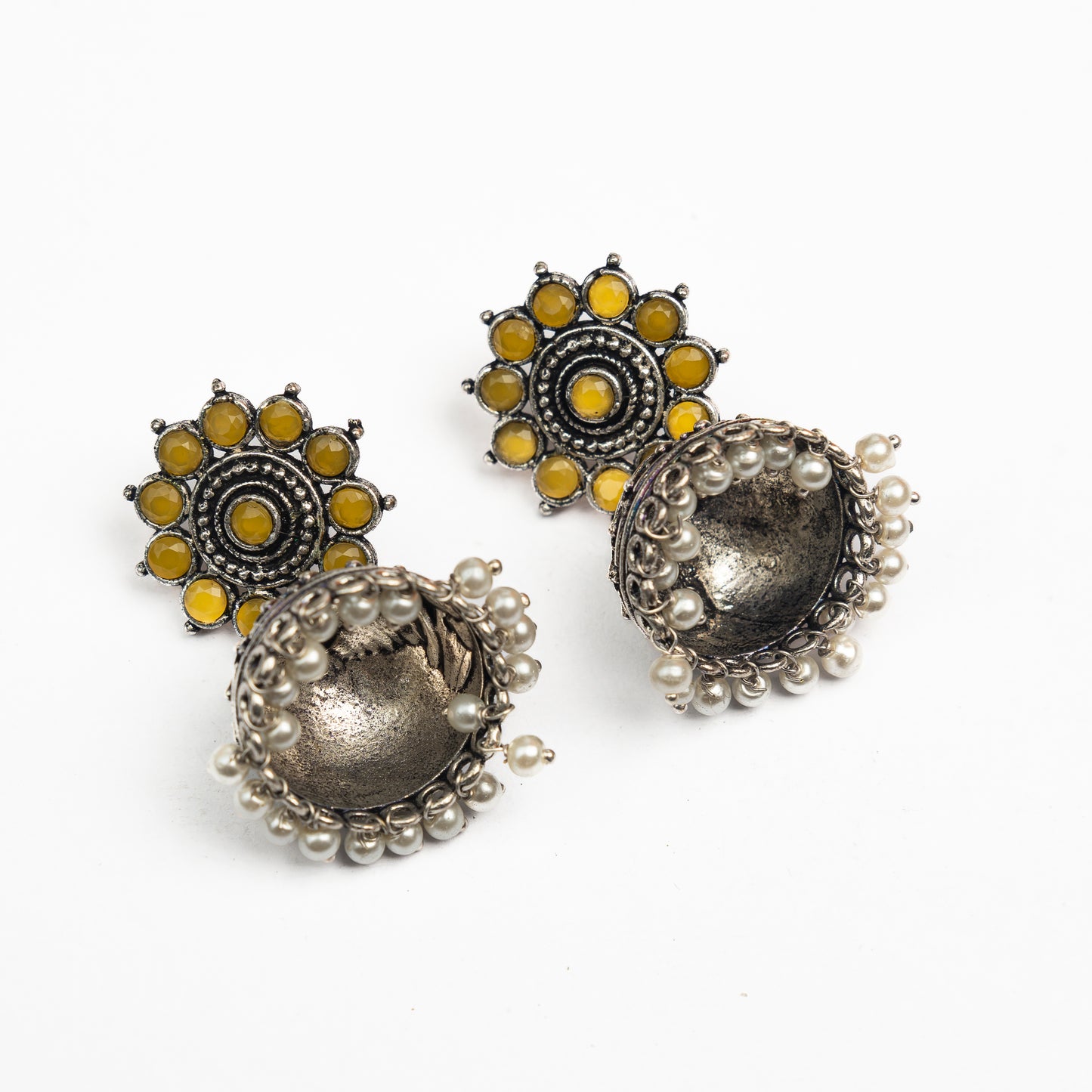 Yellow Stone Studded German Silver Jhumki Earrings With Hanging Pearls