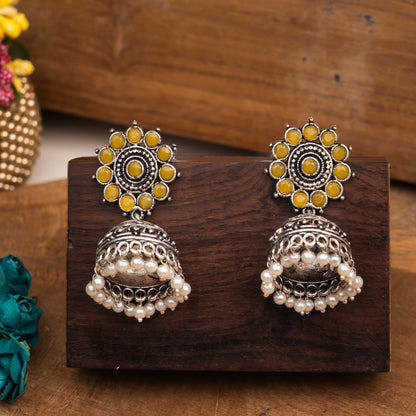 Yellow Stone Studded German Silver Jhumki Earrings With Hanging Pearls