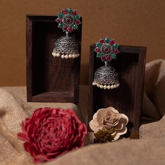 Multicolored Stone Studded German Silver Jhumki Earrings With Hanging Pearls