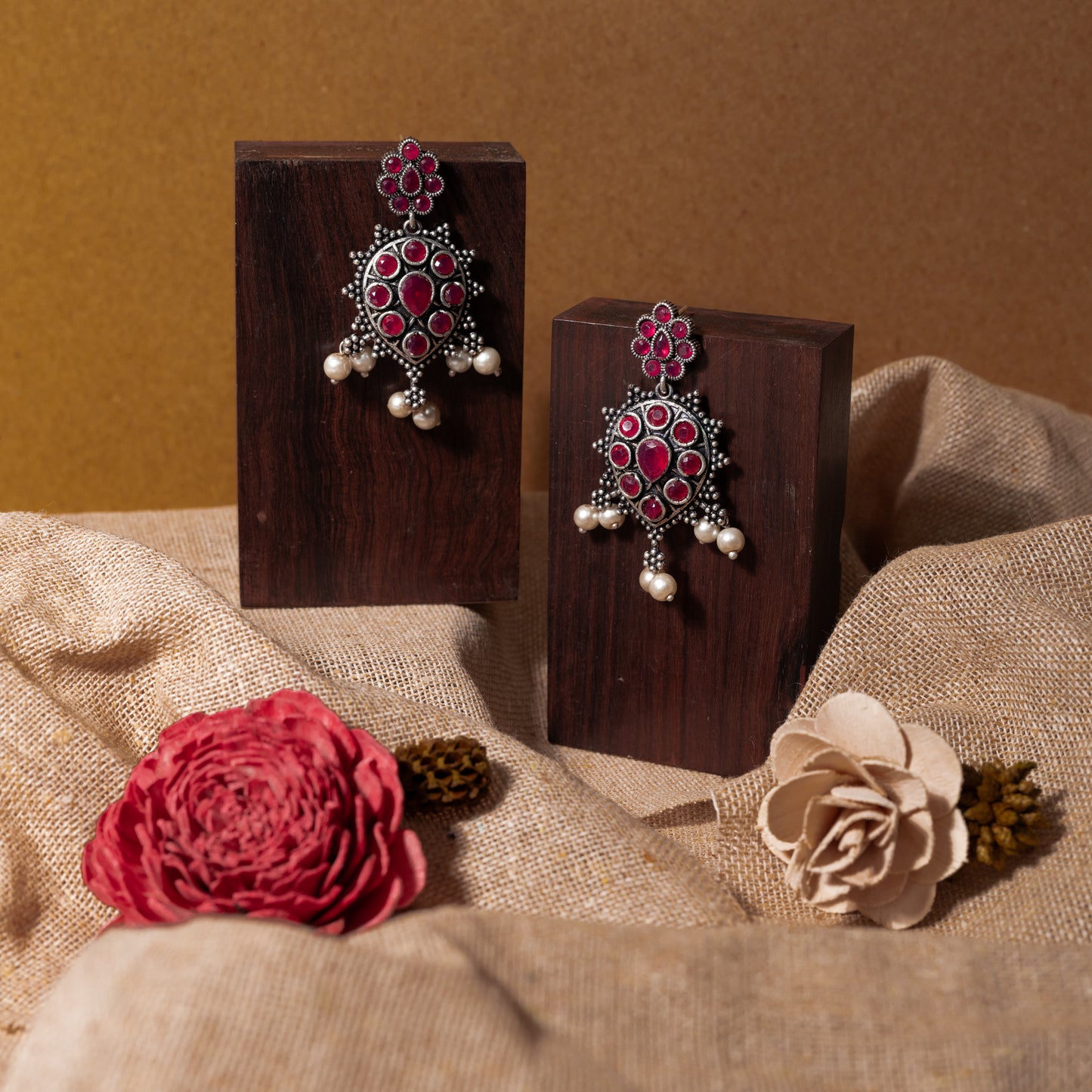 Red Stone Studded German Silver Stud Earrings With Hanging Pearls