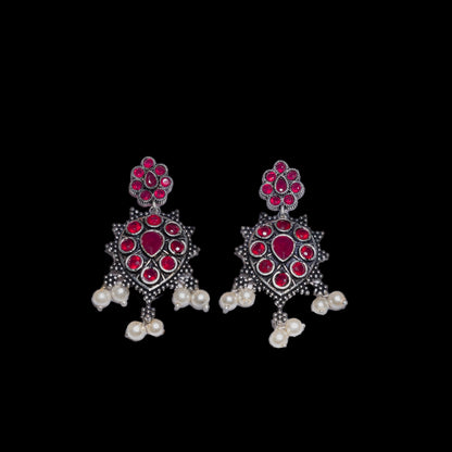 Red Stone Studded German Silver Stud Earrings With Hanging Pearls