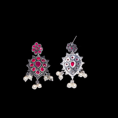 Red Stone Studded German Silver Stud Earrings With Hanging Pearls