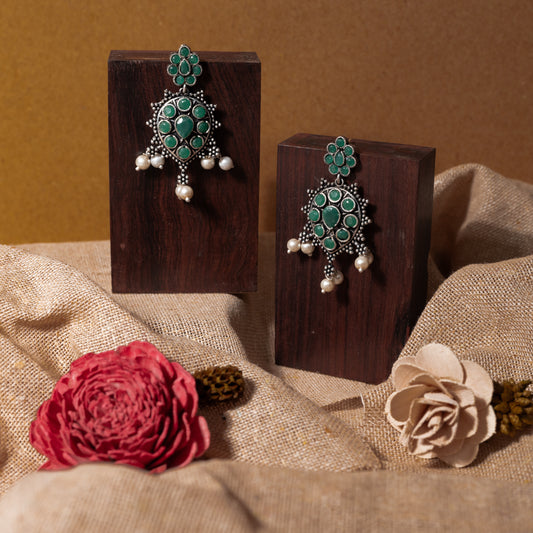 Green Stone Studded German Silver Stud Earrings With Hanging Pearls