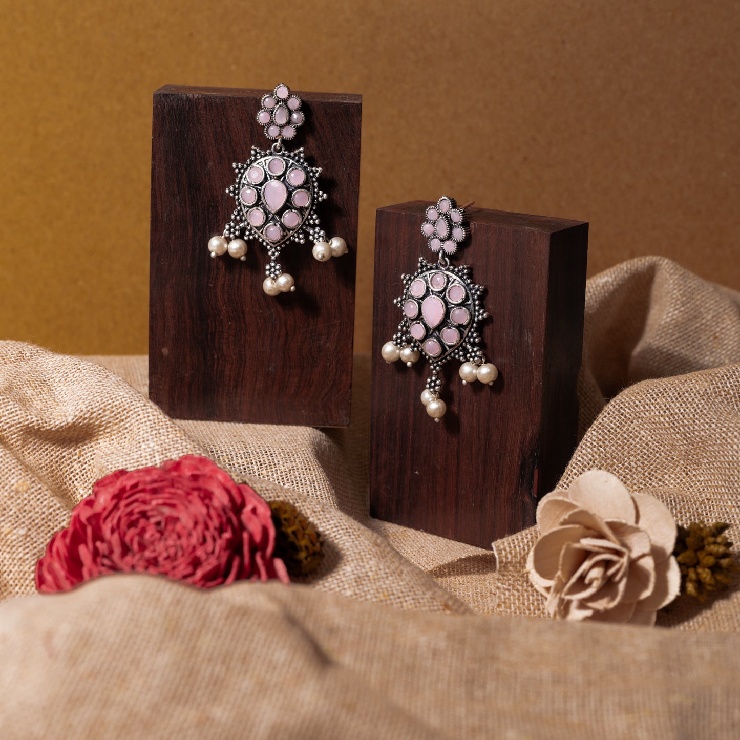 Baby Pink Stone Studded German Silver Stud Earrings With Hanging Pearls