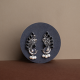 Black Stone Studded Peacock Motif Stud Earrings With Hanging Pearls