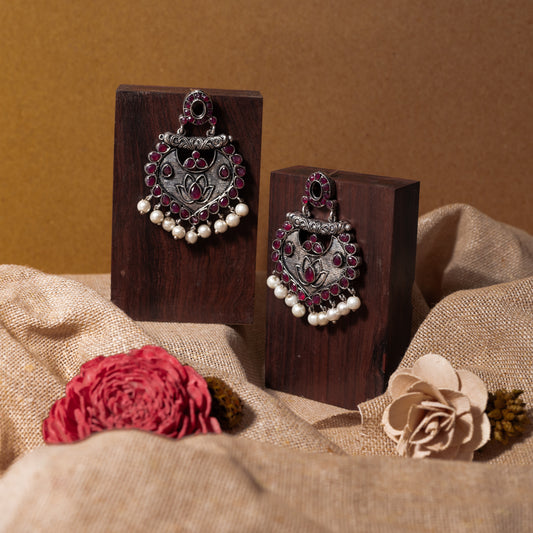 Red Stone Studded Oxidised Earrings With Hanging Pearls