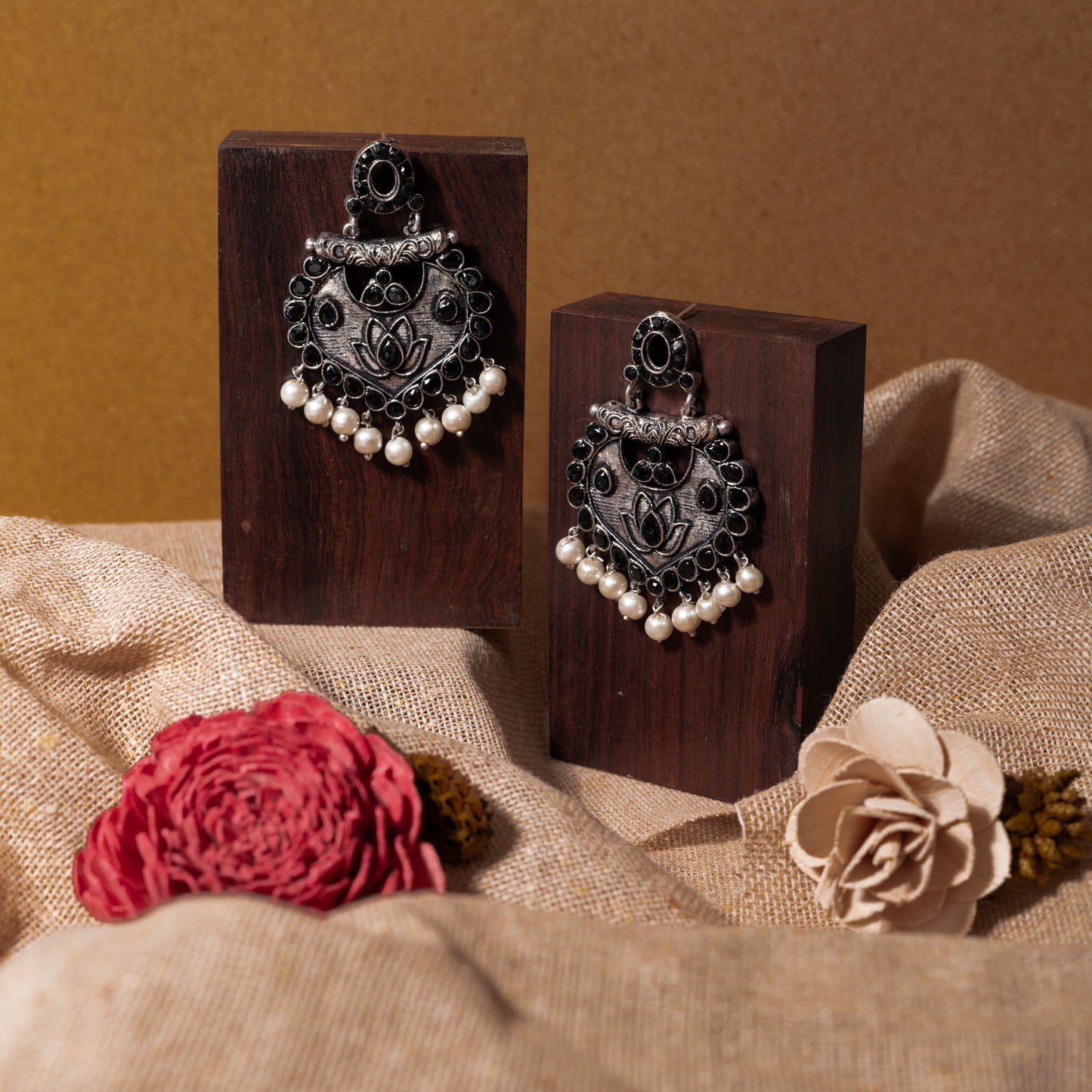 Black Stone Studded Oxidised Earrings With Hanging Pearls