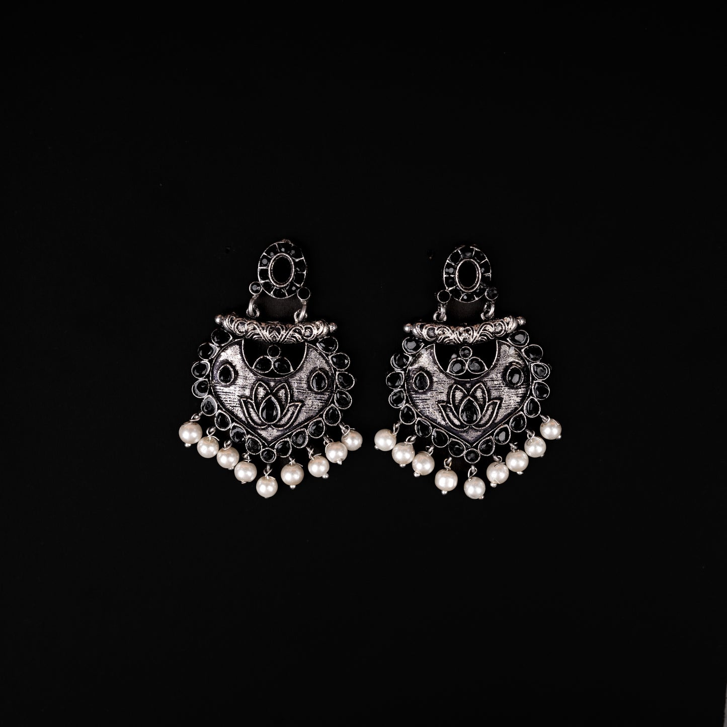 Black Stone Studded Oxidised Earrings With Hanging Pearls