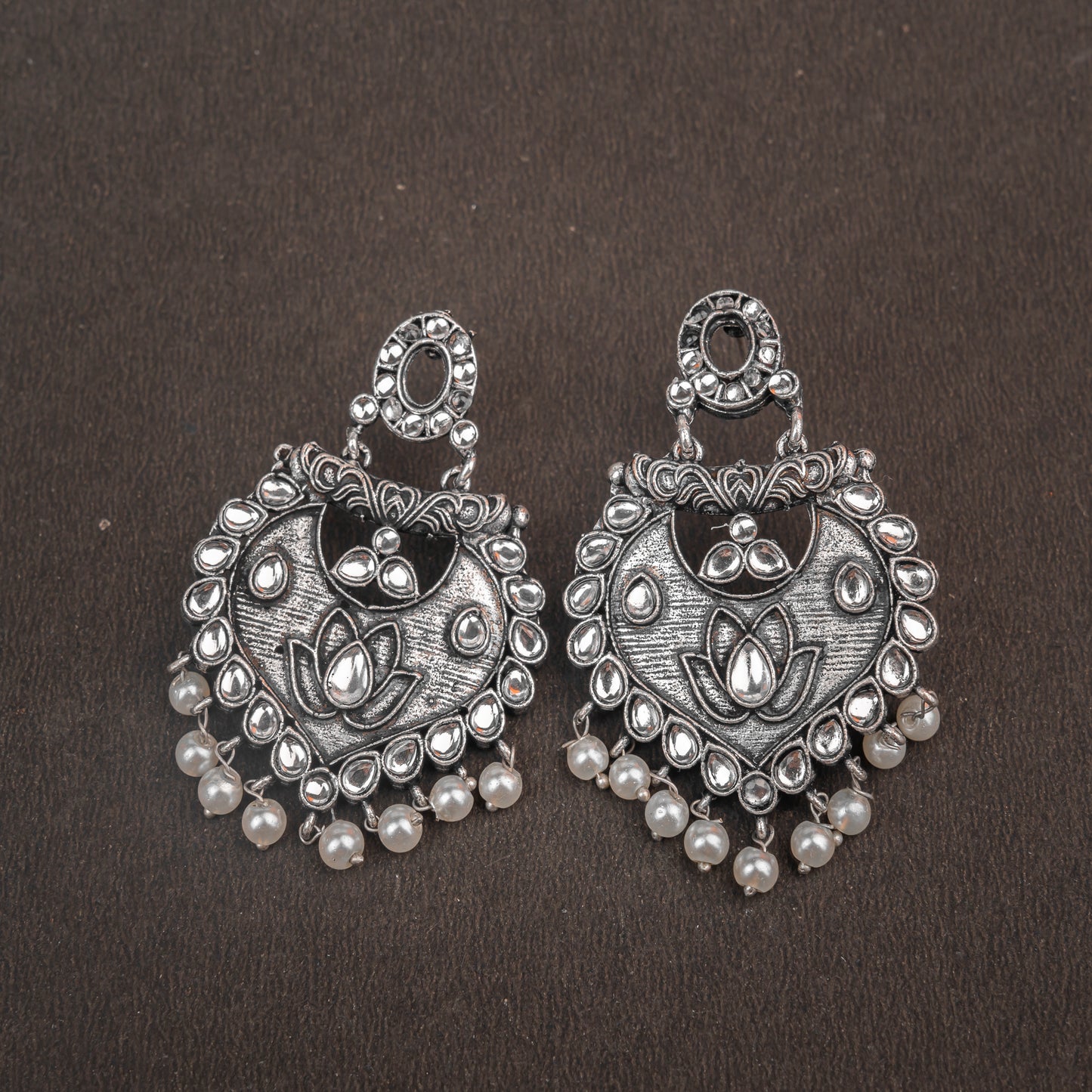 White Stone Studded Oxidised Earrings With Hanging Pearls