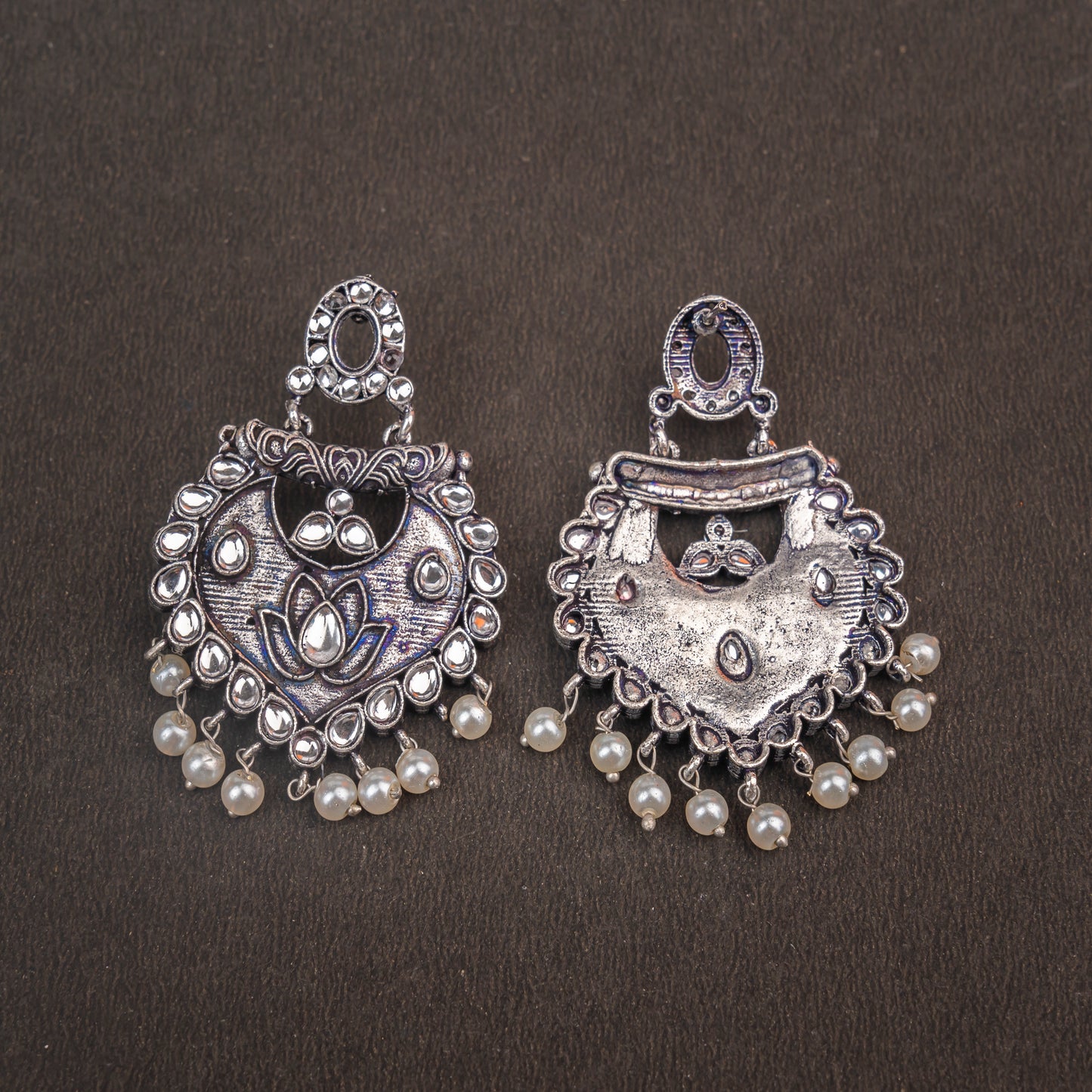 White Stone Studded Oxidised Earrings With Hanging Pearls