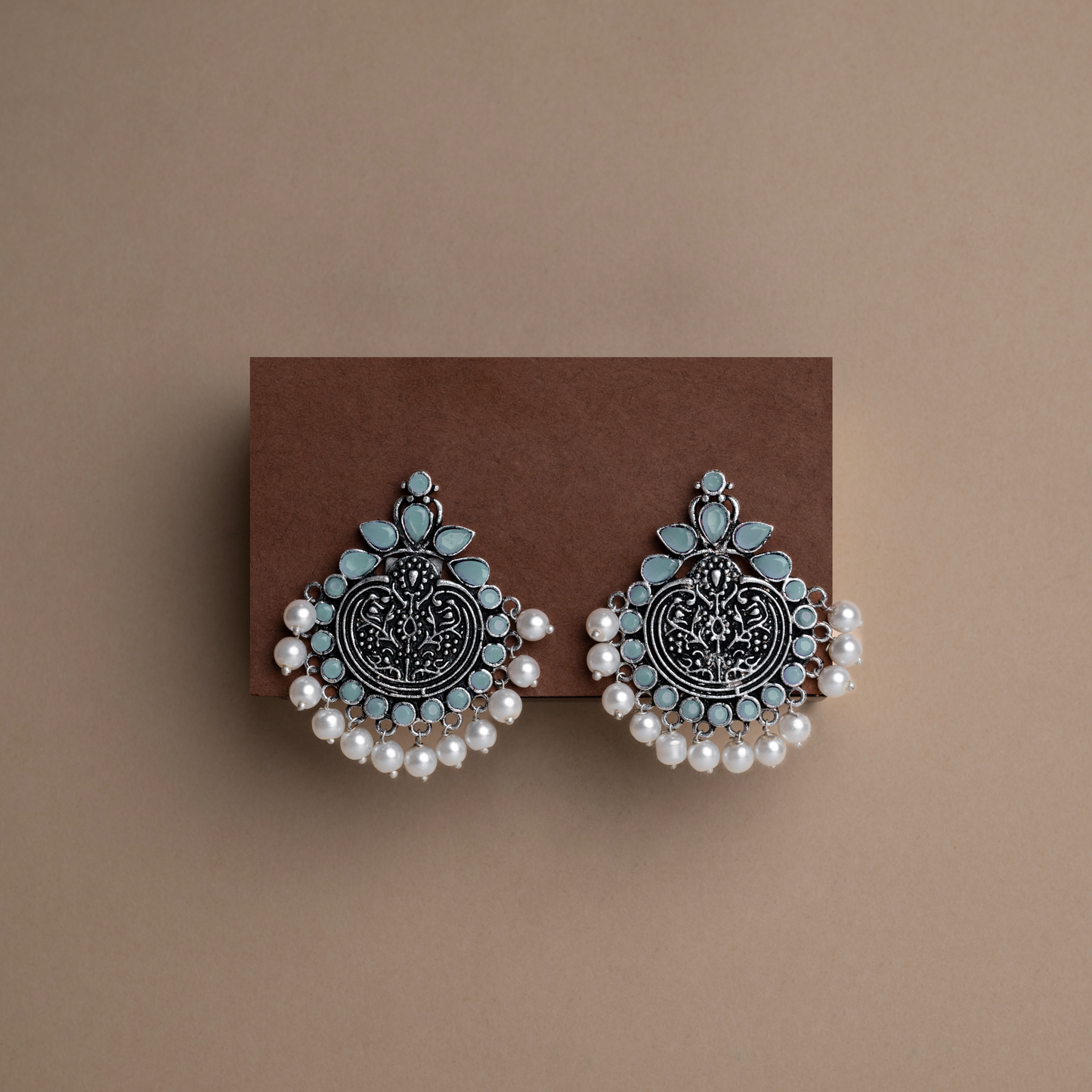 Mint Stone Studded German Silver Statement Earrings