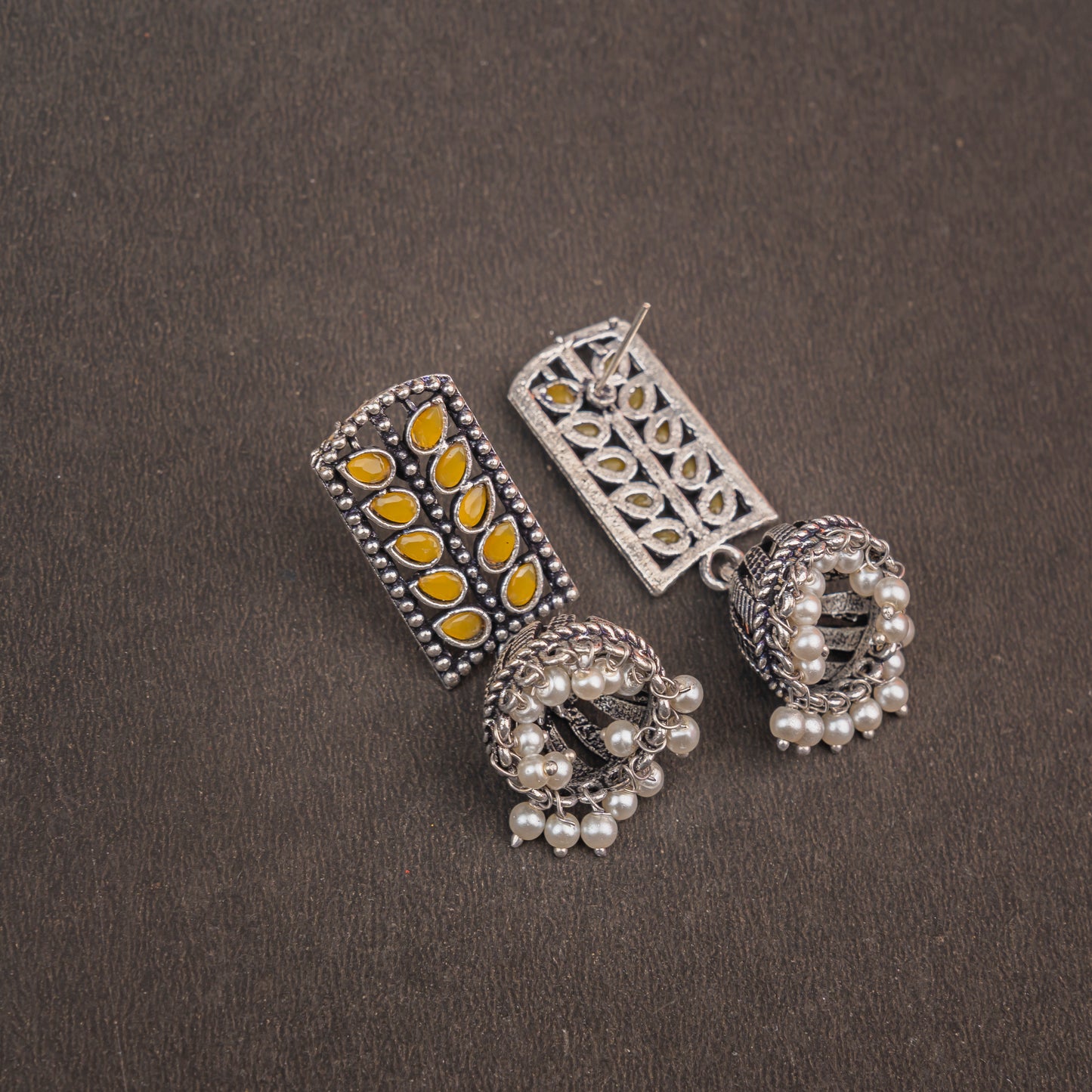 Yellow Stone Studded German Silver Statement Earrings With Brass Jhumki