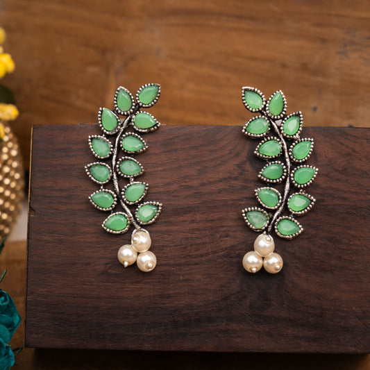 Pista Stone Studded Leaves Shaped Earrings