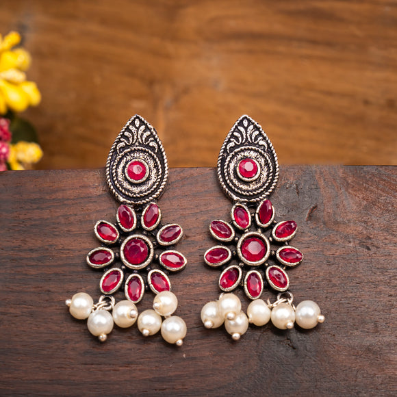 Red Stone Studded Oxidised Earrings With Hanging Pearls