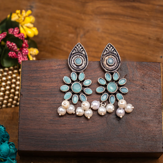 Mint Stone Studded Oxidised Earrings With Hanging Pearls