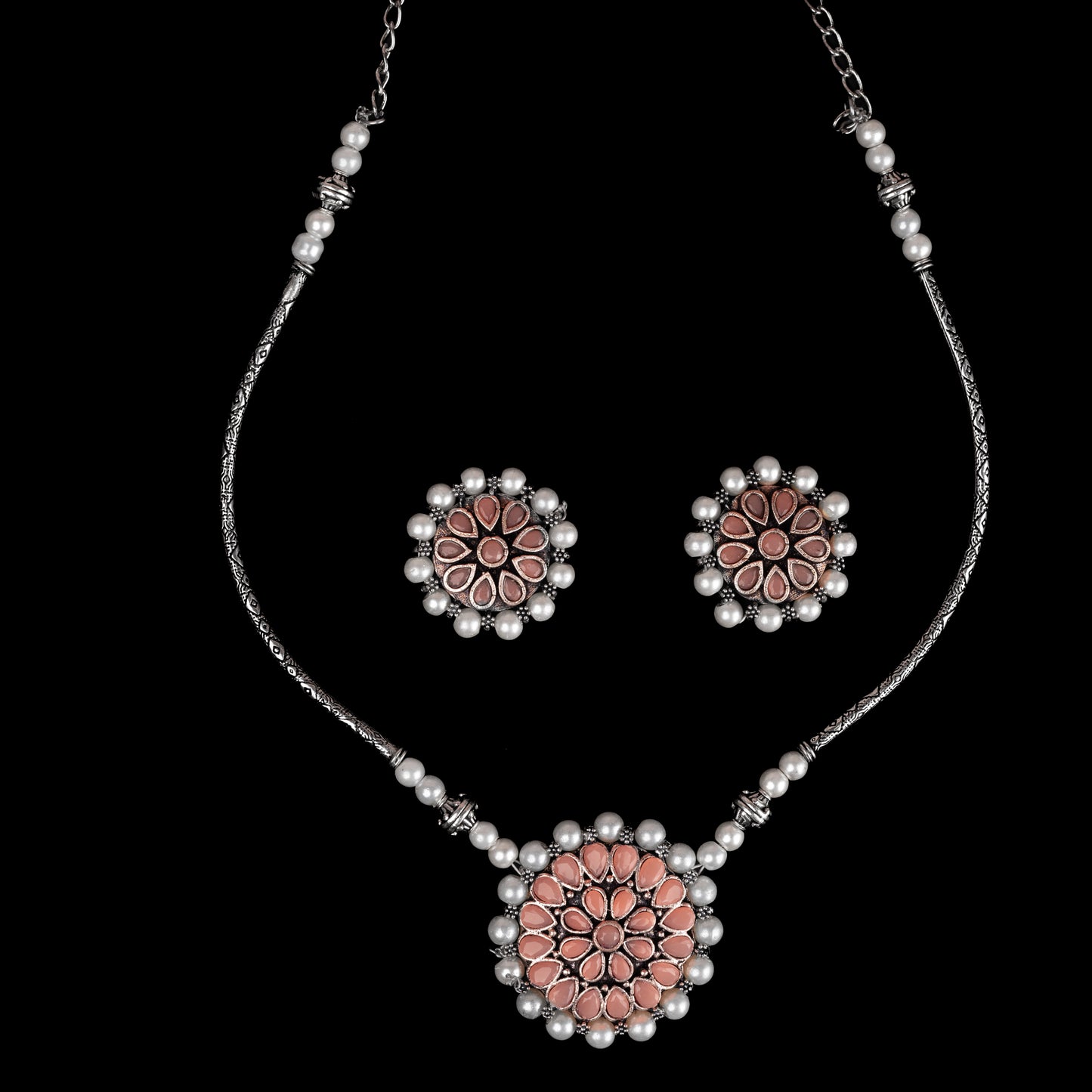 Stylish Brass Piped Neckpiece With Earrings Embellished With Light Orange Stone And Pearls