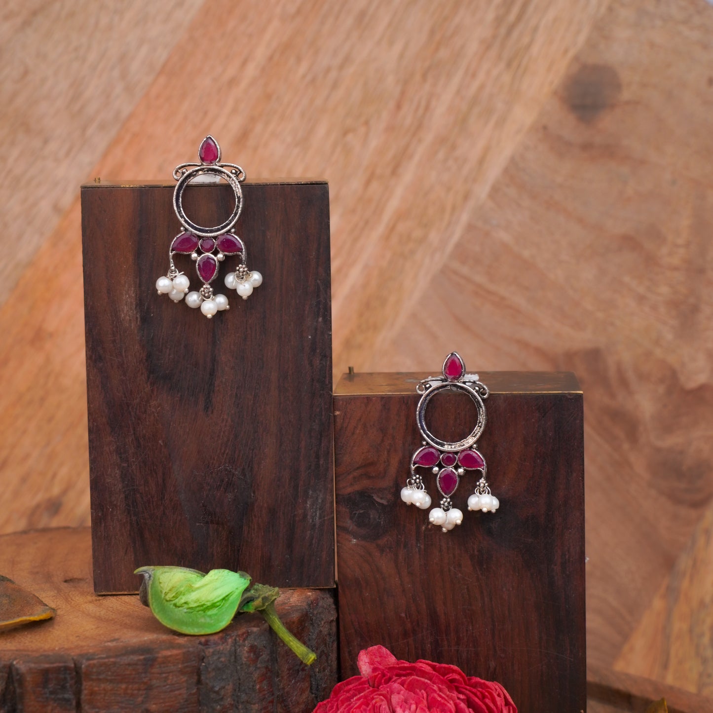 Red Stone Studded Oxidised Earrings With Hanging Pearls