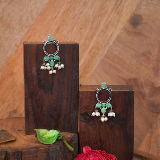 Pista Stone Studded Oxidised Earrings With Hanging Pearls