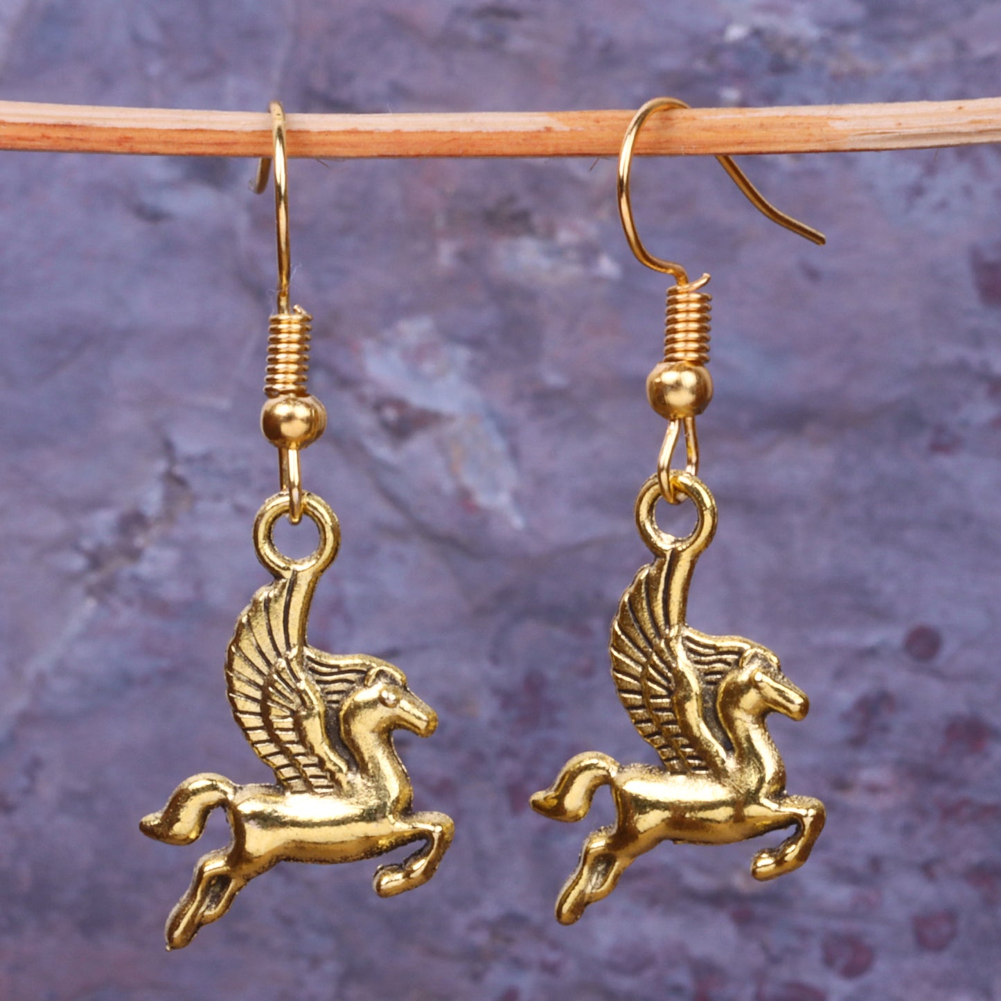 Pegasus Shaped Golden Polished Oxidised Danglers