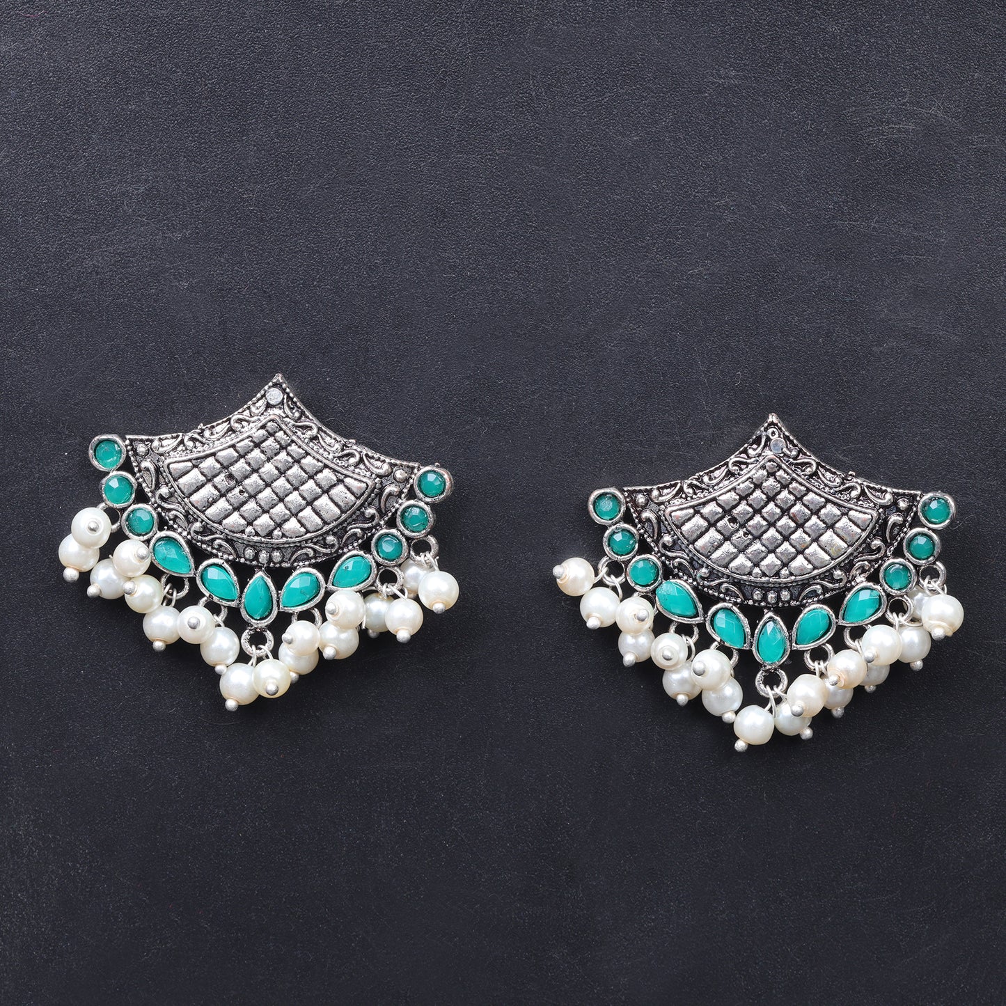 Green Stone Studded Lotus Petal Shaped Oxidised Earrings With Hanging Line Of Pearl