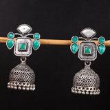 Green Stone Studded Statement Earrings With Hanging Jhumka Embellished With Baby Pearls