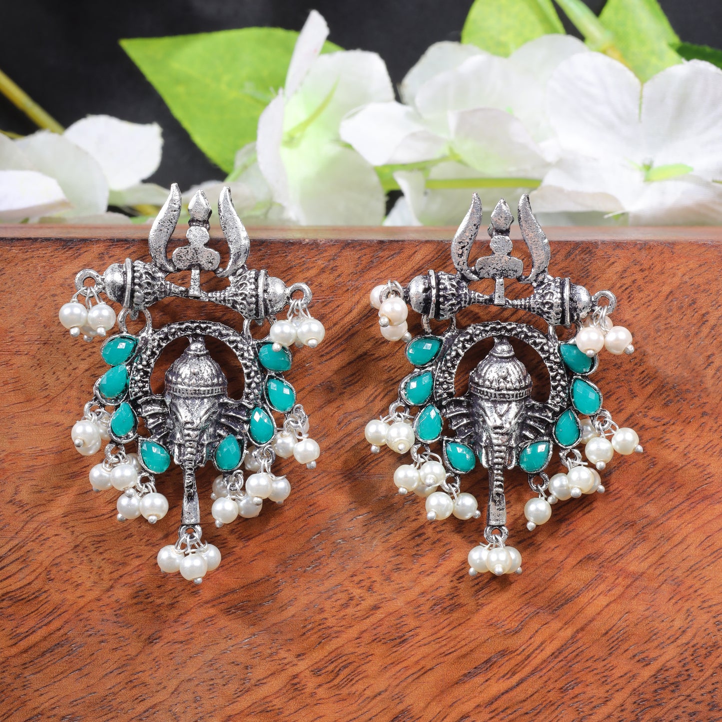 Green Stone Studded Beautiful Ganesha Earrings With Hanging Baby Pearls