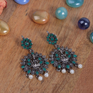Green Stone Studded Laxmi Motif Oxidised Earrings With Hanging Pearls